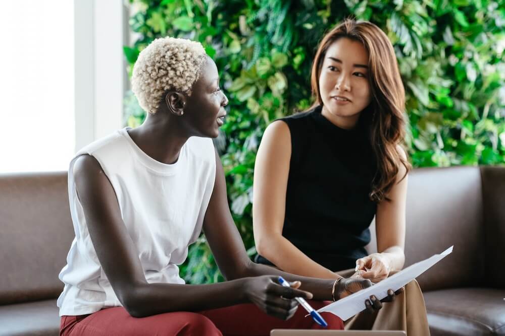 Women negotiating with another women